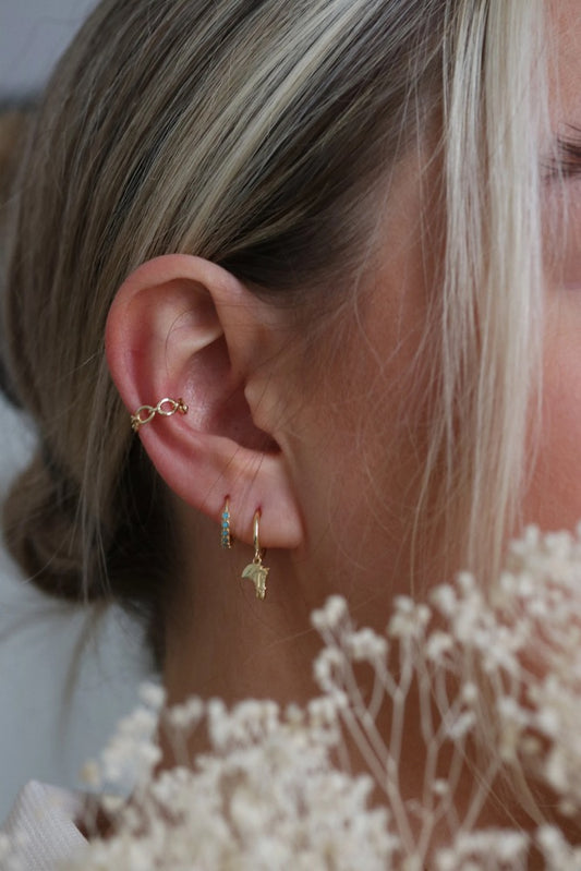 Sterling Silver/Gold Vermeil Horse Head Dangle Hoop Earrings featuring intricately detailed horse head charms on sleek hoops, perfect for adding a unique and elegant touch to any outfit.
