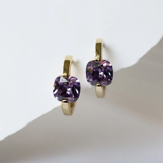 Gold Vermeil Lilac Crystal Hoop Earrings featuring sparkling clear crystals. Elegant and versatile, these lightweight hoops add a touch of glamour to any outfit, transitioning effortlessly from day to night. A timeless accessory with a radiant finish.