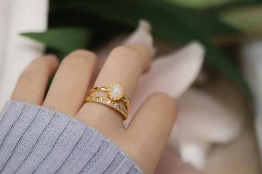 Gold Vermeil Oval Opal Ring with dainty diamond accents, featuring a glowing oval opal solitaire for a radiant, elegant look