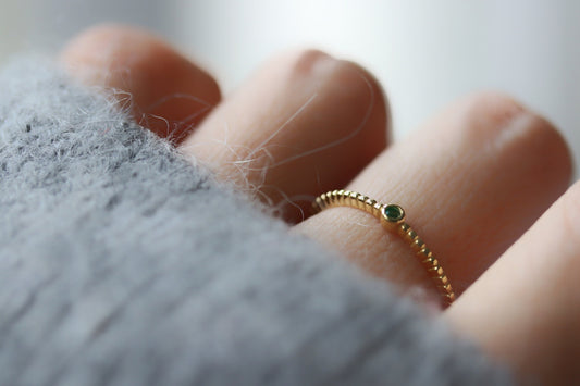 Gold Vermeil Emerald Stacking Ring with green CZ stone, minimalist dainty design, perfect for stacking or wearing alone.

