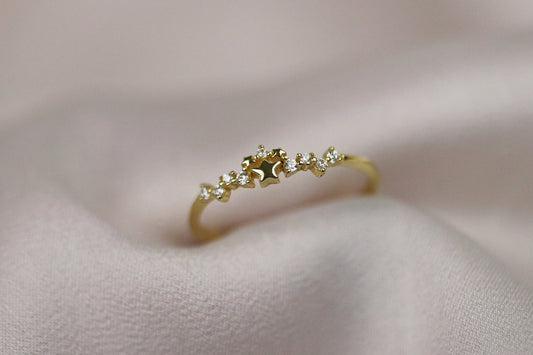 Gold Vermeil Star Cluster Ring with starburst accents, dainty celestial stacking ring, and sparkling CZ crystals.