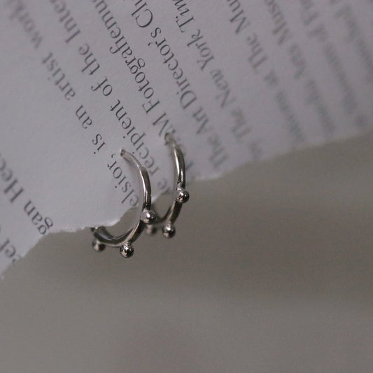 Shan&Co's Gold Vermeil/Sterling Silver Minimalist Dotted Hoops Earrings with a dainty beaded design, offering a chic, modern twist on classic hoops, crafted in premium materials for timeless elegance.