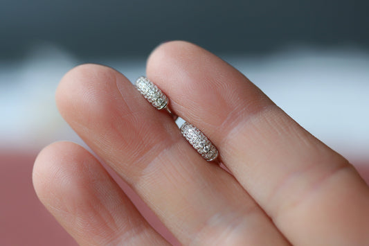 Shan&Co's Sterling Silver/Gold Vermeil Thick CZ Paved Hoop Earrings, featuring a bold pave design with sparkling CZ stones, paired with CZ Chunky Huggies Earrings for a chic, radiant look.